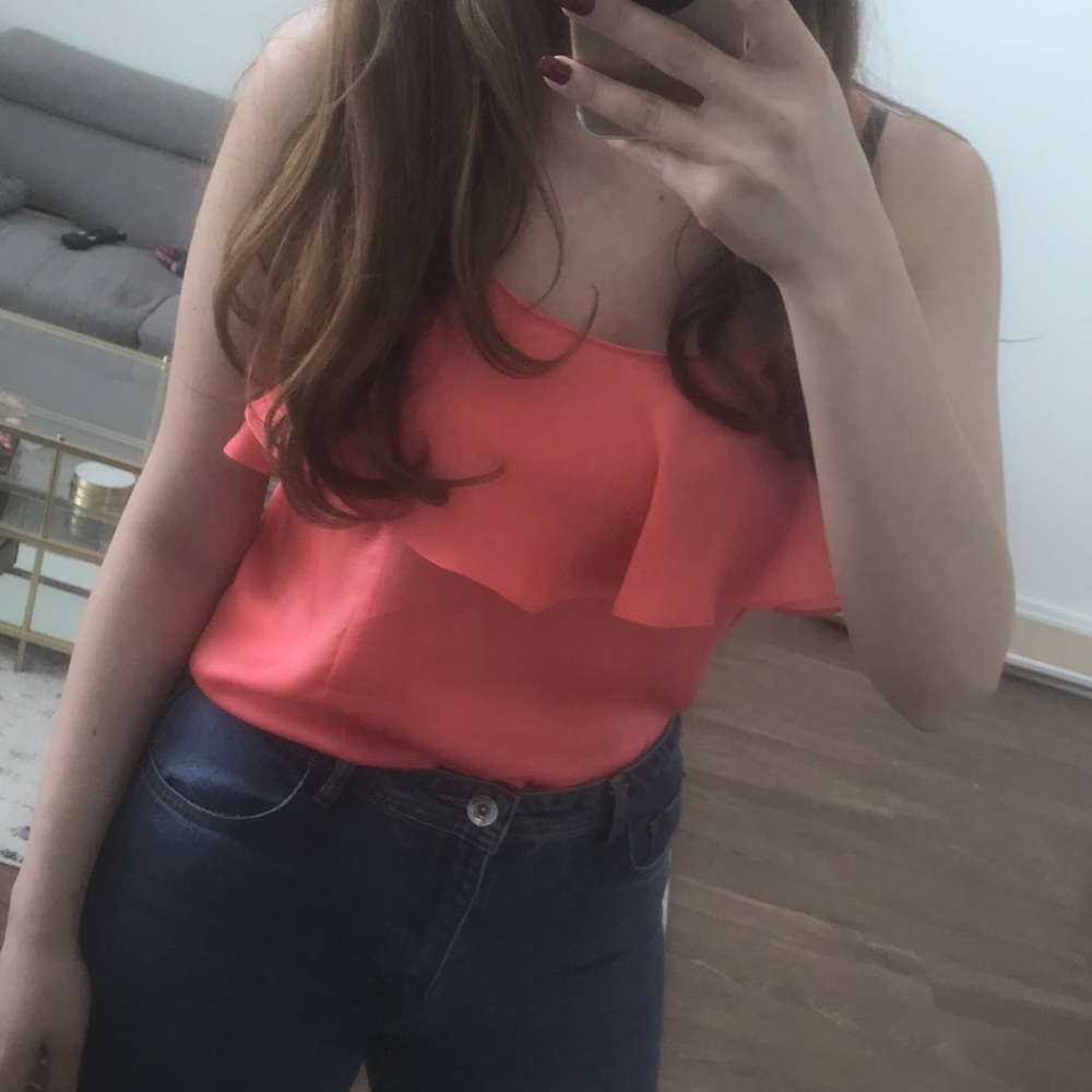 Orange/pink top with ruffle details